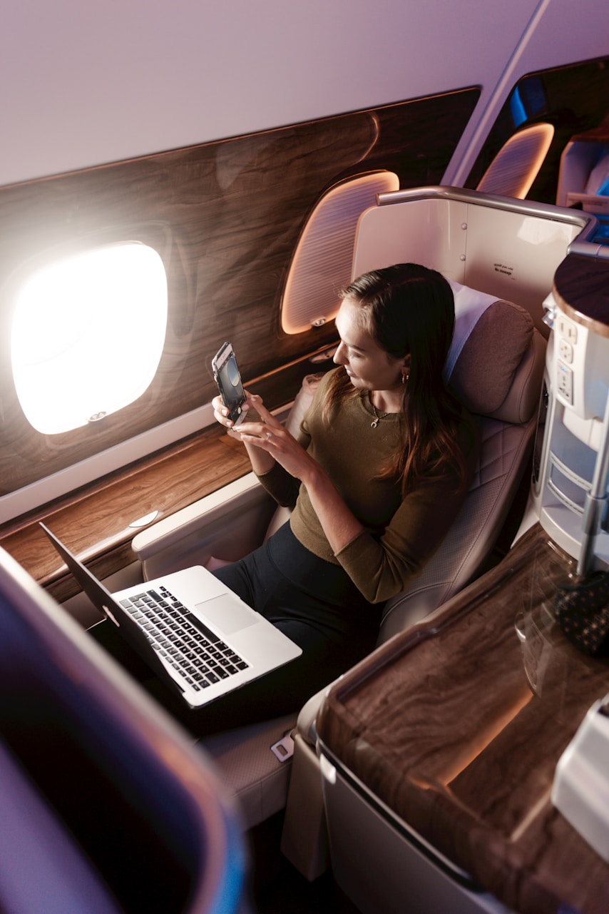 Traveler working on a plane